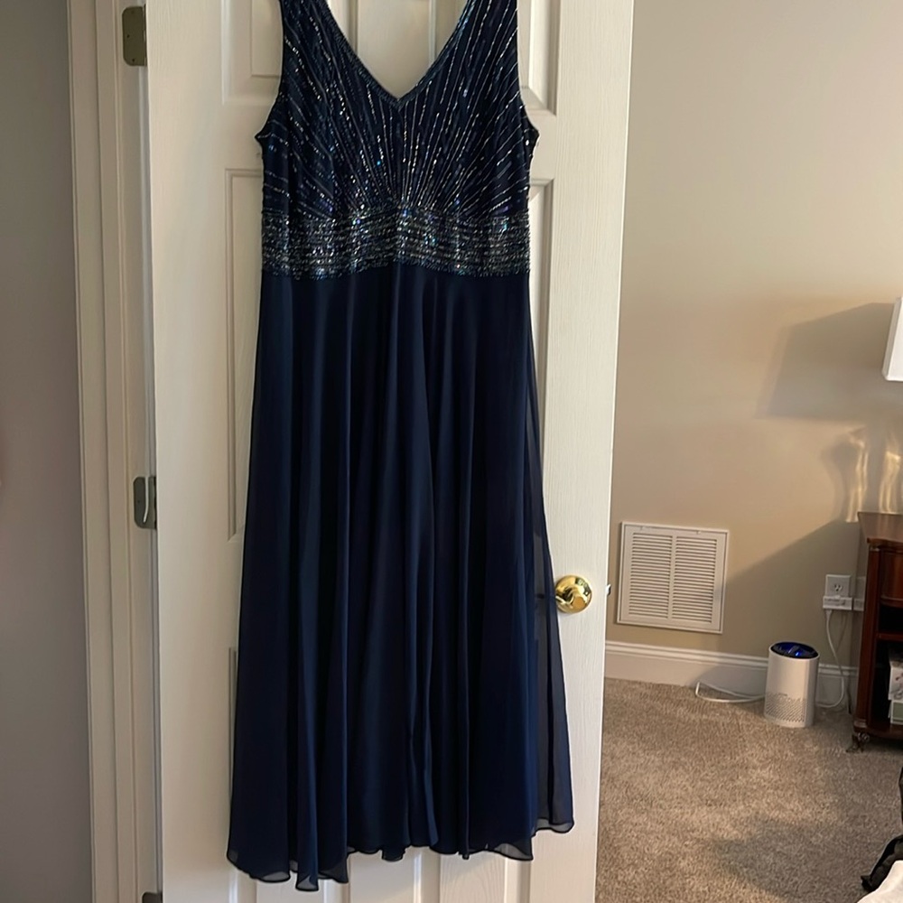 Navy blue evening gown. Size 22W.. Purchased at Nordstrom. Worn by 5’4 woman.